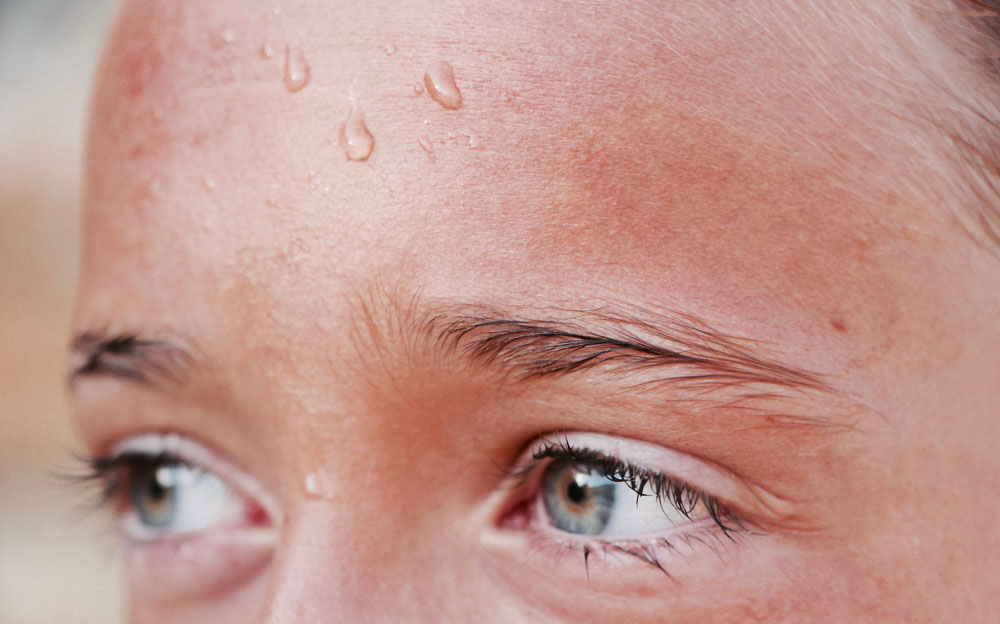 Sweat is almost entirely water being released through the skin.